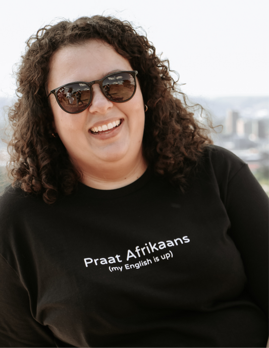 "Praat Afrikaans (my English is up)" t-hemp